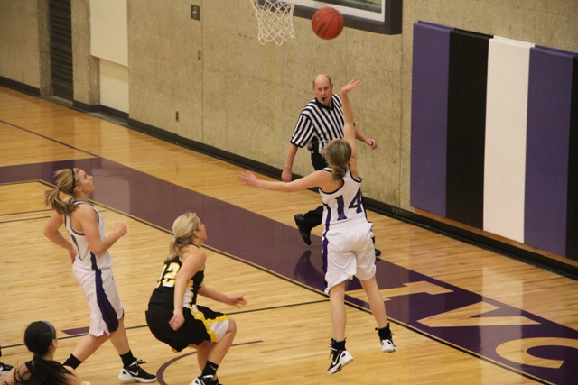 Haley Phelps (14) makes an open layup against Black Hawk College on Jan. 10. Left alone