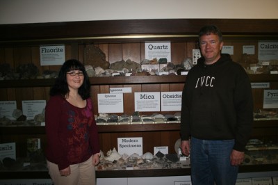 Staff member reorganizes geology exhibit