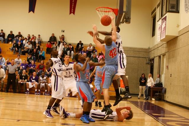 The IVCC Mens Basketball team defends against a lay-up in a game against UW-Rock County on Nov. 3