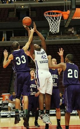 Perry Adams takes a shot at the United Center with four defenders surrounding them as IVCC went on to beat Prairie State College on Jan. 7. 