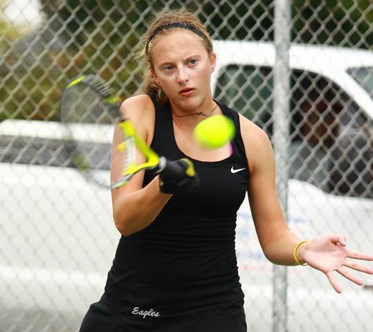 April Kutz, a 
sophomore, returns a ball in a match earlier this season. Kutz and the Lady Eagles tennis team placed third in the Region IV 
tournament and qualified for the 
national tournament in Tyler, Texas. The team narrowly missed a second place finish in the  region. Kutz took third in No. 1 
singles and second in No. 1 doubles with Karly 
Rosencrans.