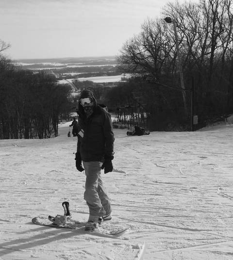 Jake Stricklin stands at the top of a slope, preparing for a crazy ride.