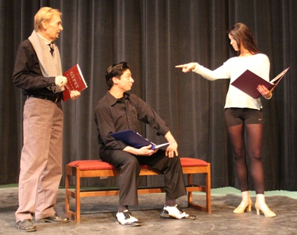 Director Don Grant Zellmer (left) works with cast members Alex Guerrero
and Emily Hanck as they prepare for the musical “Gypsy.”