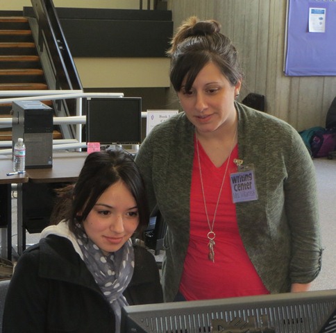 English instructor Nora Villarreal works with a student in the
Writing Center. Villarreal is this year’s recipient of the Faculty
Excellence Award.