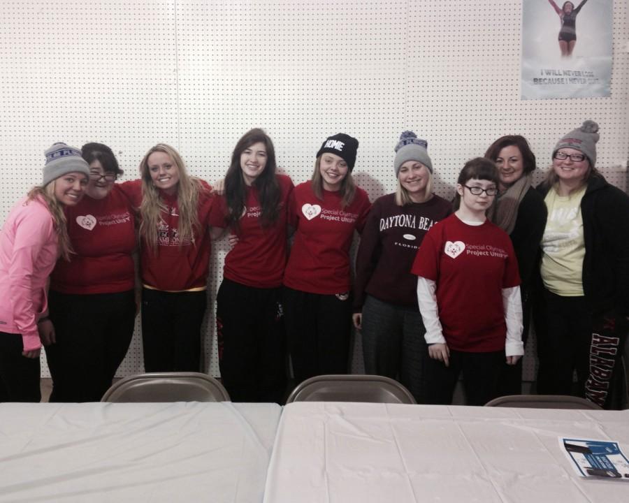IVCC Polar Plunge team members get together with LPHS transition program members for a picture before taking the plunge. The team includes (from left) Sarah Turinetti, Amira Khoija, Elizabeth Rice, Carly Haywood, Sam Halm, Brianna Bertolino, Maegan Walton, Mamie Pioli, and Megan Ellerbrock.