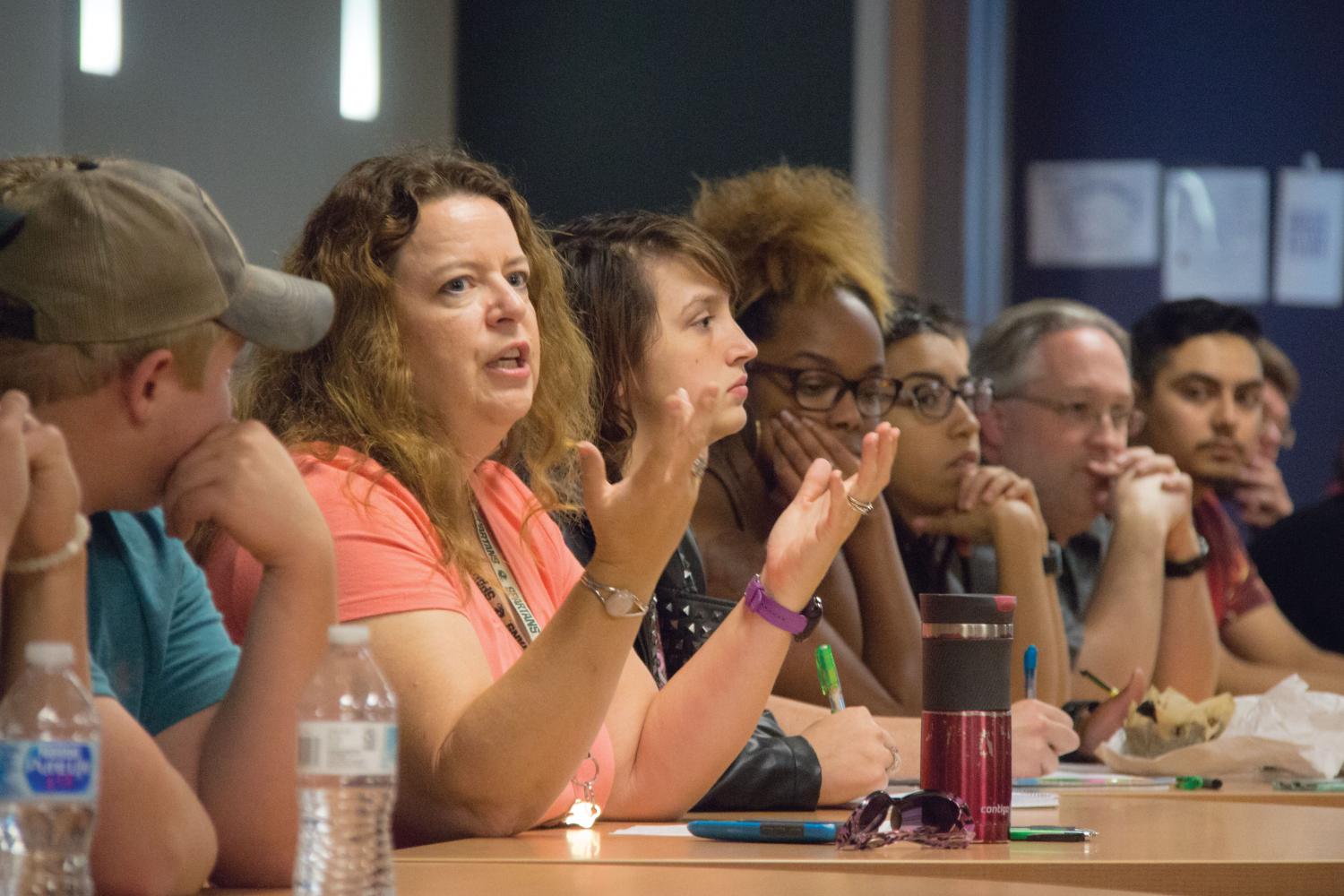 A large group attended the brown bag lunch discussion to reflect on the Aug. Charlottesville riots.