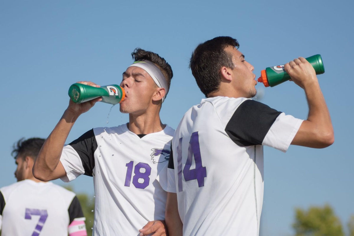 Men’s soccer players Isaac Casas and Davy Arteaga rehydrate vs Malcolm X in a non-conference matchup. Their next game is 4 p.m. Friday, Sept. 22 at LaSalle Rotary Park.