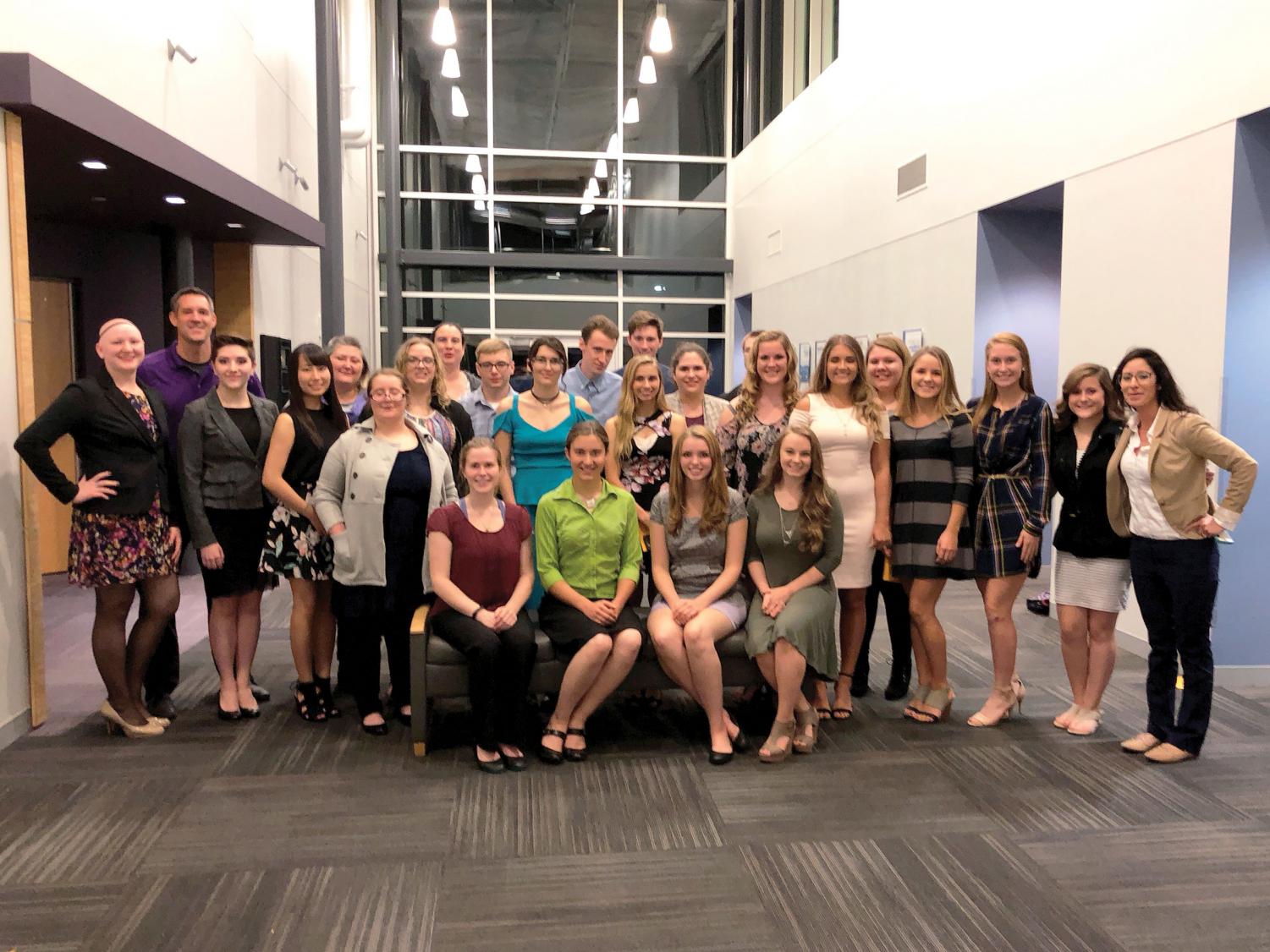 Welcome to Rho Omega
PTK officers, advisors, and new inductees pose Oct. 10 after fall induction ceremony