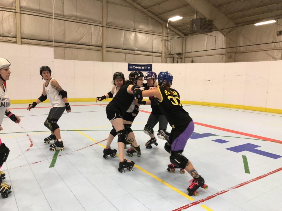 Barbed Wire Betties practing a braced-wall drill in Sycomore. Pictured from left to right, Demon, Slaughtermelon, Millennial Falcon and TsumAmy.