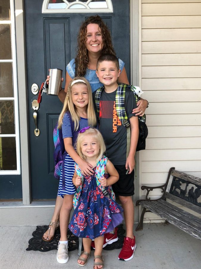 Naomi Pickens and her three children ready for their first day of the school year.