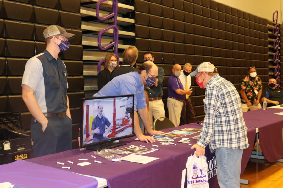 Art Koudelka speaks to an attendee of College and Career Night