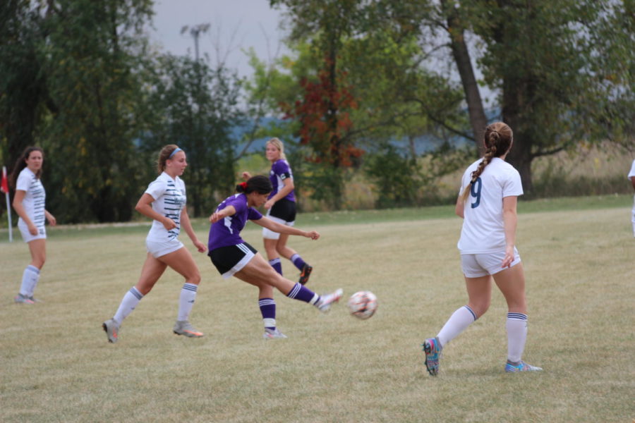 Ashlee Calamaco powers the ball  toward the goal. The  Eagles struggled with low numbers this season and finished with an 0-10 record, after forfeiting their regional playoff game.