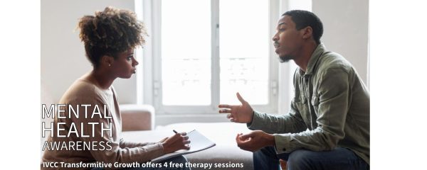 picture of a therapist and a patient talking.