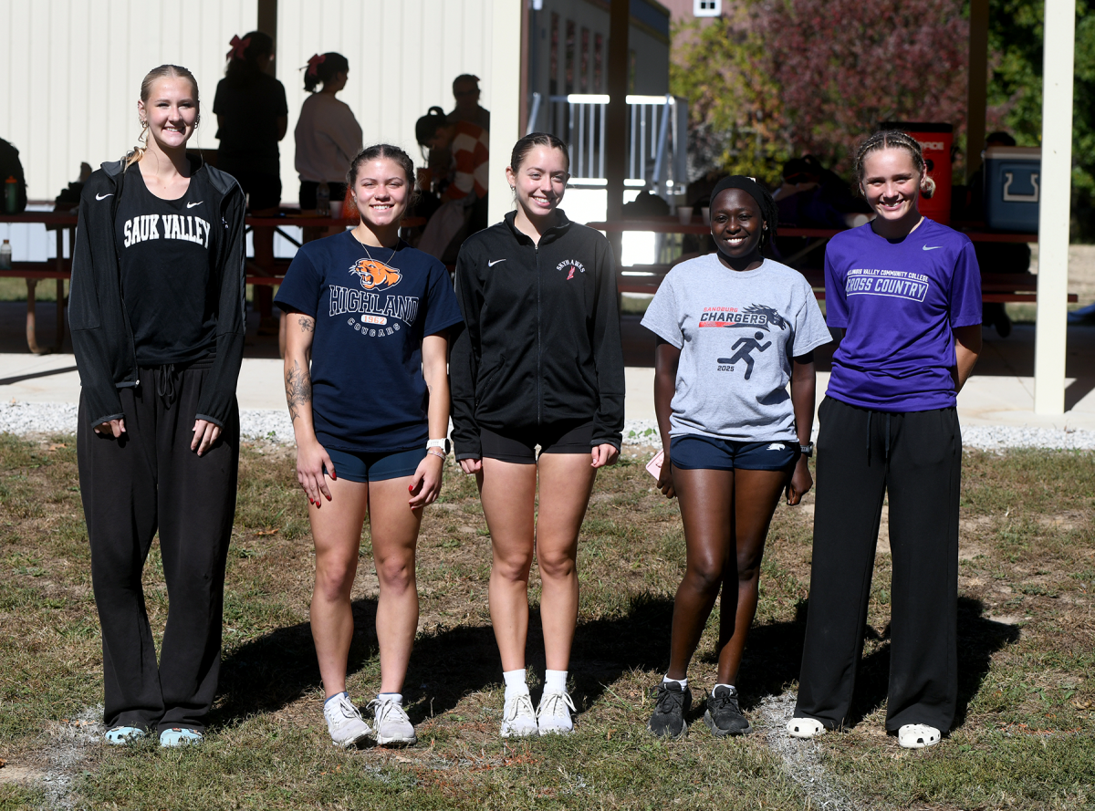 The top five finishers in the women's cross country conference meet included Addyson Miller of Ottawa (left).