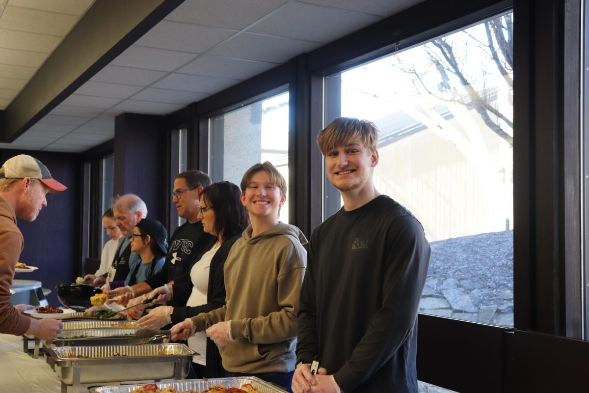 Students Volunteer for IVCC's Black History Month soul food buffet event