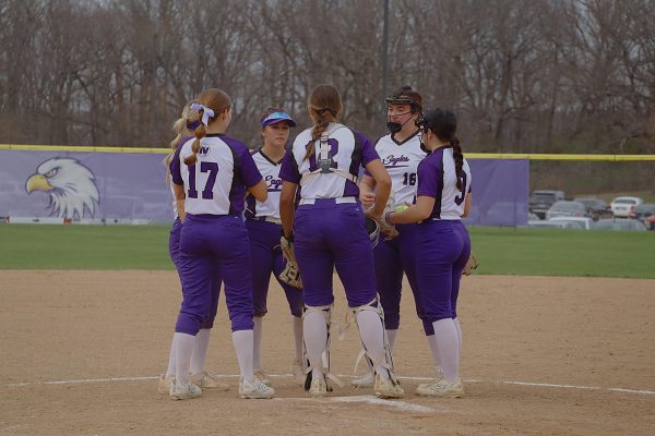 IVCC infield players meet at the mound to discuss strategy during a recent contest. The team is preparing for regional competition. 