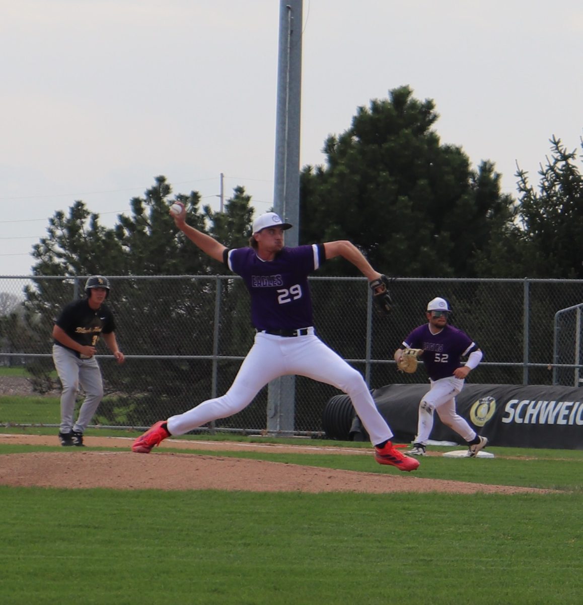 IVCC freshman Aiden Rogers from Georgetown pitches to Black Hawk 